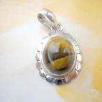 Trendy 925. sterling silver round tiger eye's pendant