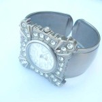 bangle-watches, Square cz bronze bangle watch with circular clock face design Square cz bronze bangle watch with circular clock face design