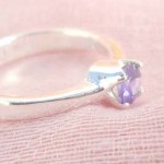 ring, 925. stamped silver ring with a round purple cubic zirconia design 925. stamped silver ring with a round purple cubic zirconia design