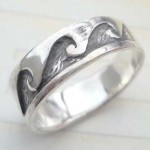 Collectible stamped 925 sterling silver ring with graved moutain design