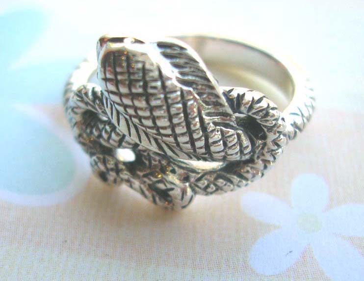 Stamped 925. silver ring with curvy snake