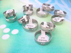 Stainless steel rings with cut out designs
