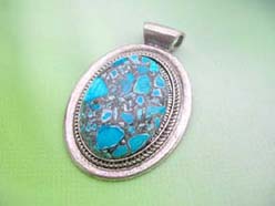 Genuine gemstone pendant in turquoise blue color