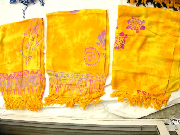 Tie dye yellow sarong in assorted stamped pattern design