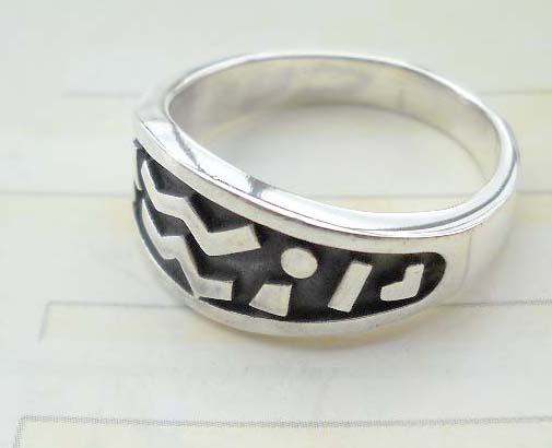 925. stamped silver ring with ancient sign design