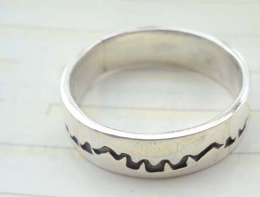 925. stamped silver ring with ancient sign design