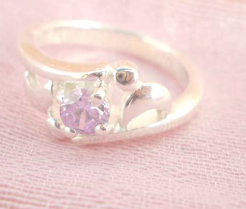 Great stamped 925 sterling silver ring with open shape holding pinky cz flower design