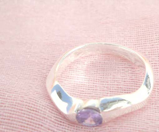 Great stamped 925 sterling silver curvy band with amethyst cz ring