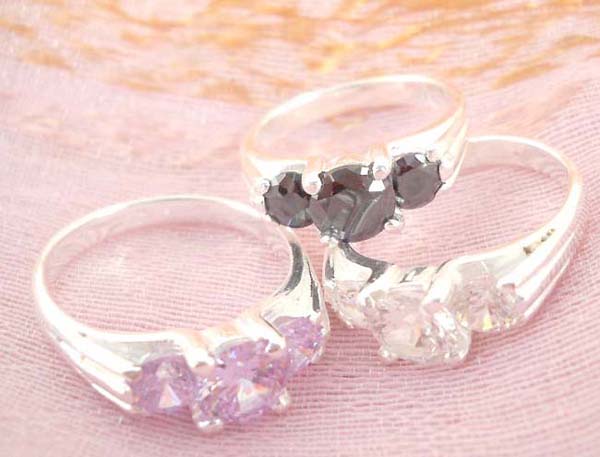 925. stamped silver ring with assorted triple crystal design