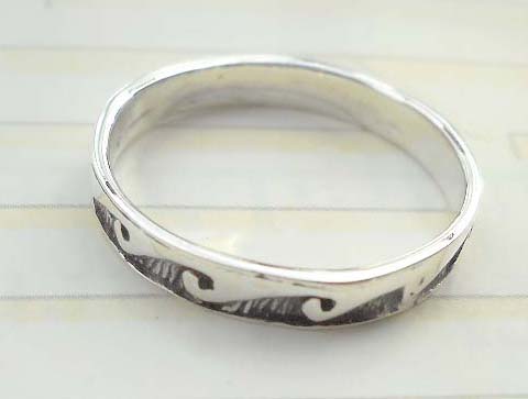 Unique 925 sterling silver ring with ocean wavy design