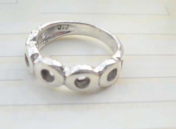 Plain stamped 925 sterling silver ring with multi O shape design
