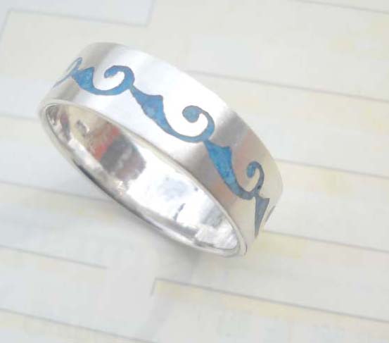 Plain stamped 925 sterling silver ring with blue color wavy design