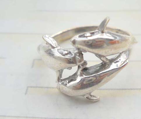Unique 925 sterling silver ring with triple dolphin design