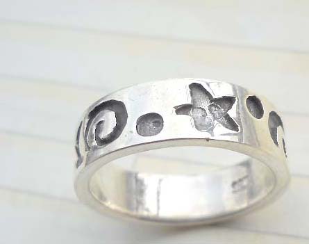 Swirl and star design,designer inspired 925. sterling silver ring
