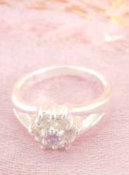 925. stamped silver ring with a multi mini cubic zirconia forming in flower design