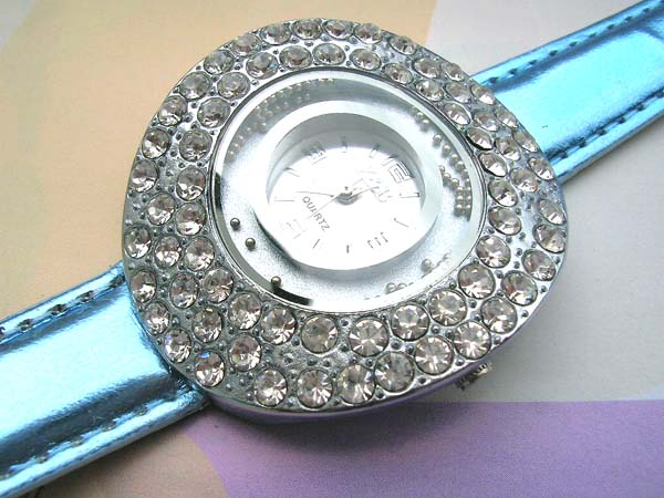 Great fashion blue watch with clear cz climbing on watch face 